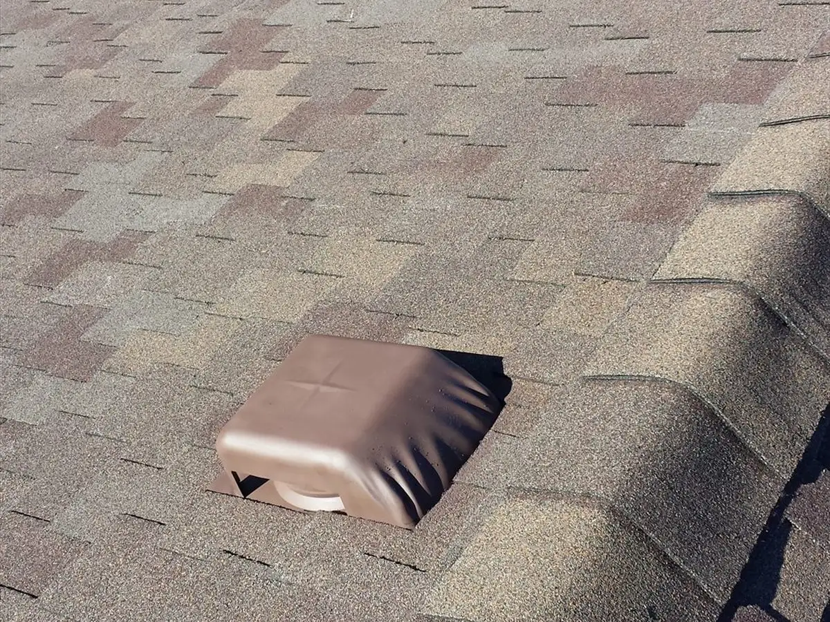 CertainTeed Presidential shingles in Autumn Blend with a roof vent near the ridge