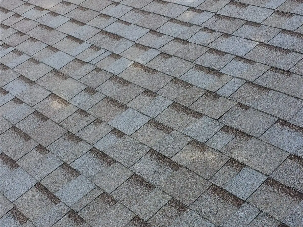 Field of new Owens Corning shingles in Amber